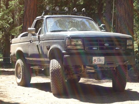 1995 Ford Bronco - This 1995 Ford Bronco is equipped for off-road adventures with its lifted suspension and roof-mounted lights.