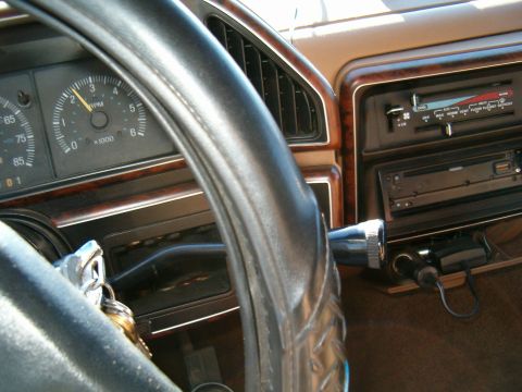 1990 Ford Bronco - Interior view of a 1990 Ford Bronco, focusing on the dashboard and steering wheel details.
