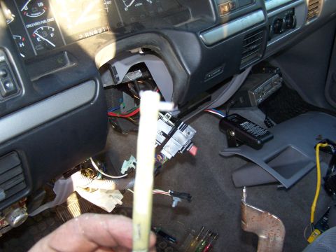 1995 Ford Bronco - The interior of a 1995 Ford Bronco shows exposed wiring and components around the steering column, suggesting a repair or modification isss…