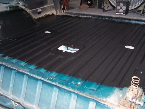 1995 Ford Bronco - The interior bed liner of a 1995 Ford Bronco has been coated with black spray-on material.
