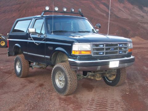 1995 Ford Bronco - This lifted Ford Bronco has a distinctive grille and body style consistent with the early to mid-1990s.