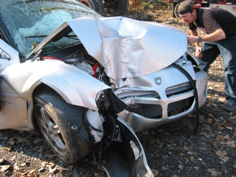 2001 Ford Taurus - This severely damaged Dodge Viper shows extensive front-end collision damage.