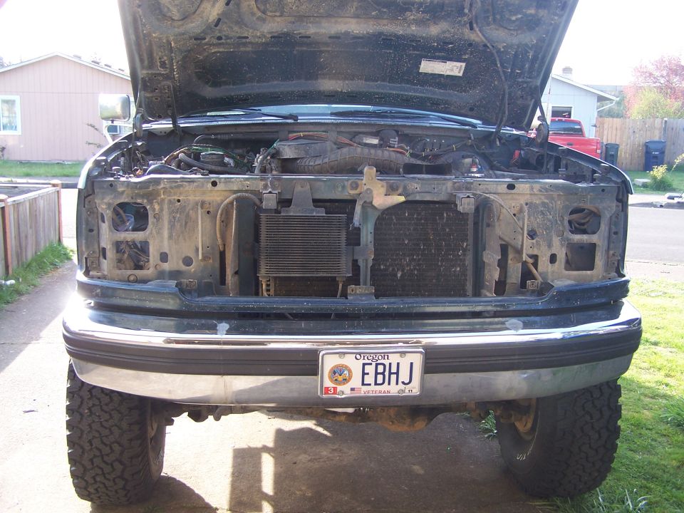 1995 Ford Bronco front view, hood open, showing engine and radiator