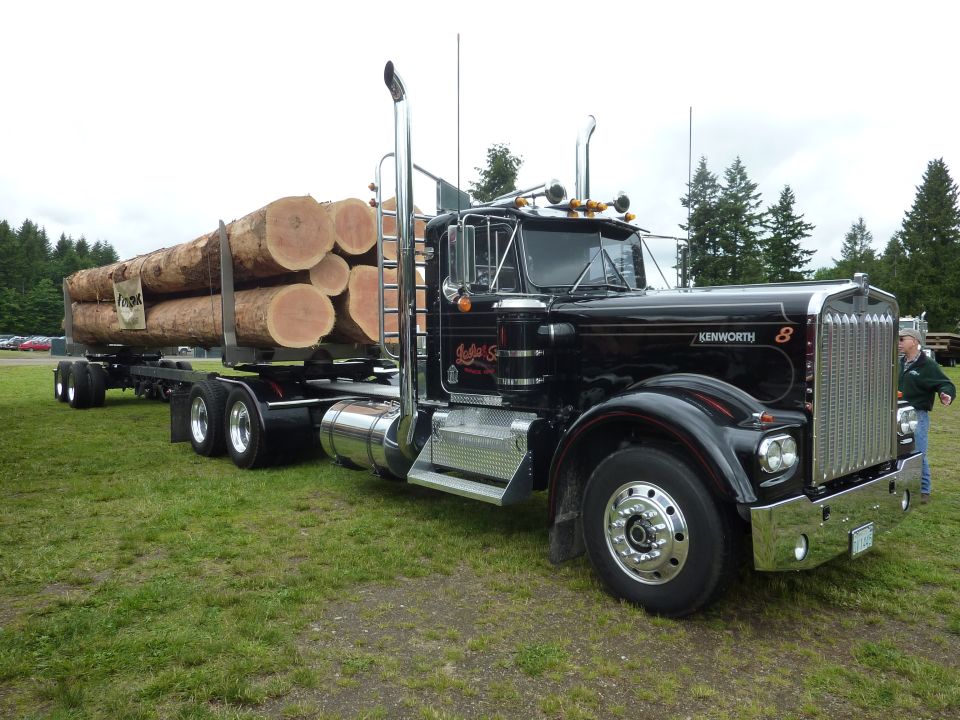 1959 Kenworth W900A logging truck and trailer loaded with logs