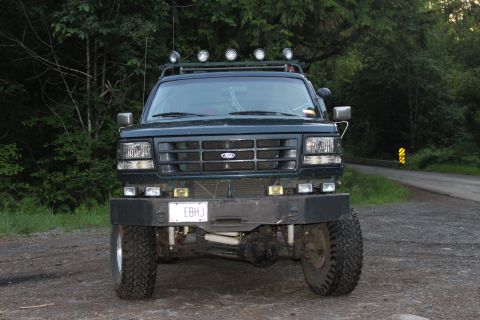 1995 Ford Bronco - This Ford Bronco features a custom front bumper and auxiliary lights mounted on the roof rack.