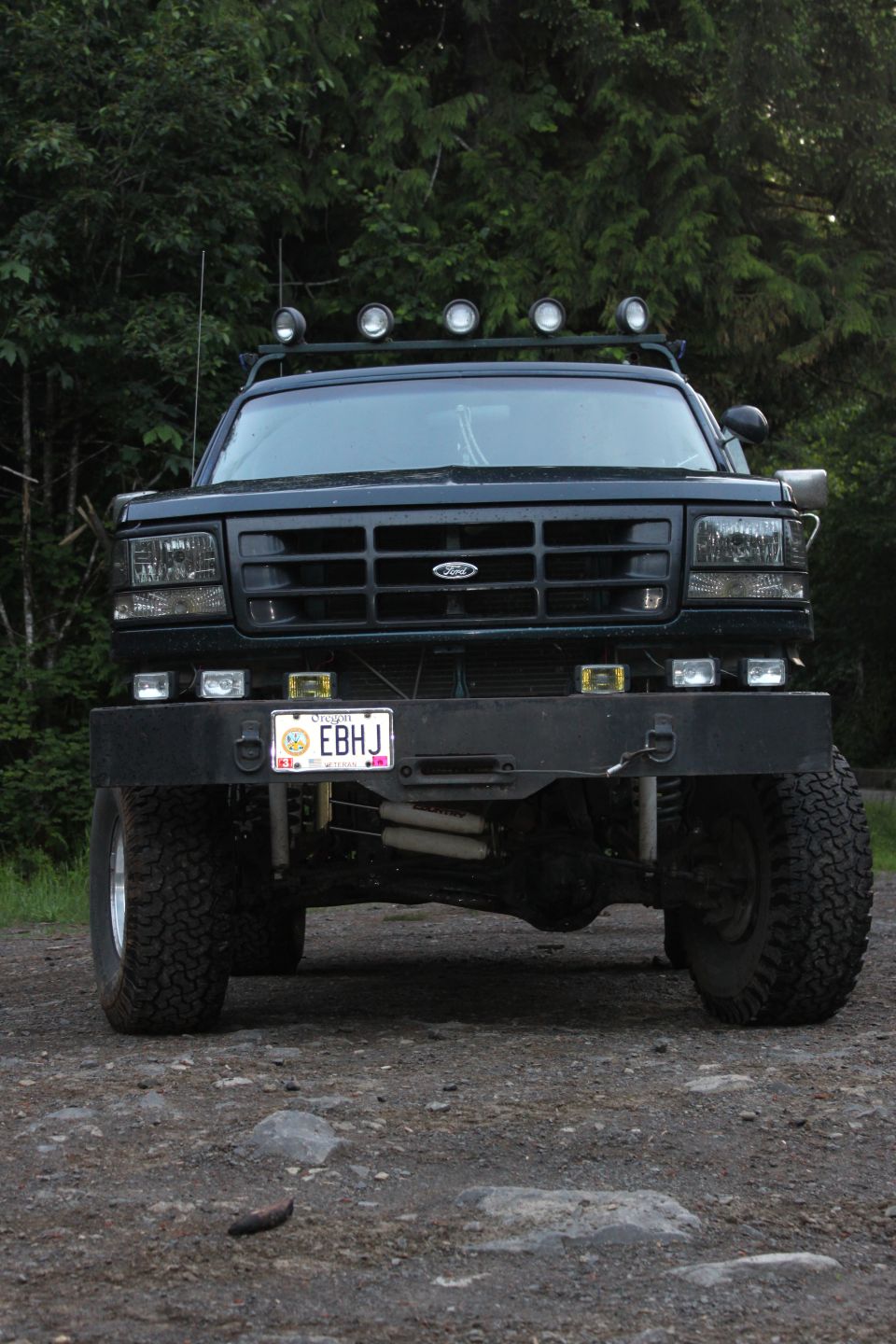 Front view of a 1995 Ford Bronco with aftermarket bumper and lights