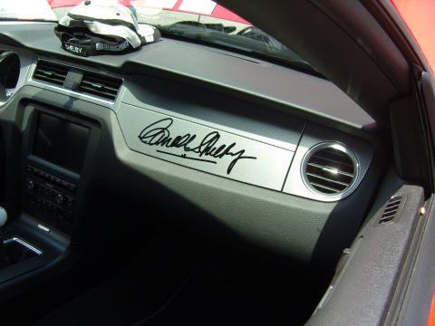 2007 Ford Mustang - Interior view of a 2007 Ford Mustang, a Carroll Shelby signature on the dash.