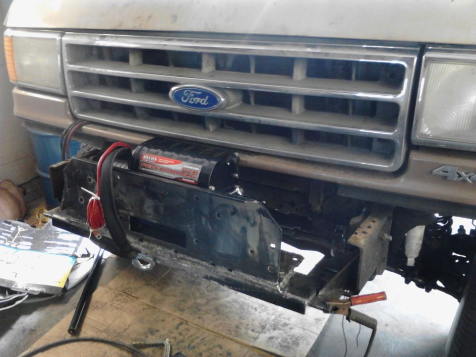 1989 Ford Bronco front grille with winch and red tow strap