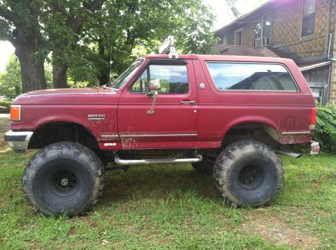 1991 Ford Bronco - This modified Ford Bronco sits high on massive tires, ready for off-road adventures.