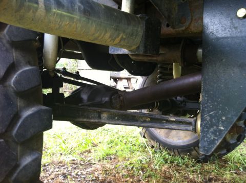 1991 Ford Bronco - Undercarriage view of a 4x4, highlighting its robust suspension and drivetrain systems.