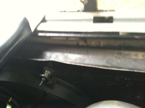 1991 Ford Bronco - Radiator and hood latch assembly detail.