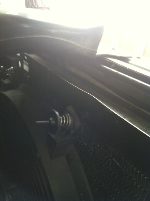 1991 Ford Bronco - Hood latch mechanism detail, likely from a vehicle.