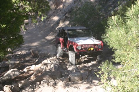 1991 Ford Bronco - This classic Ford Bronco navigates a challenging, rocky off-road path.
