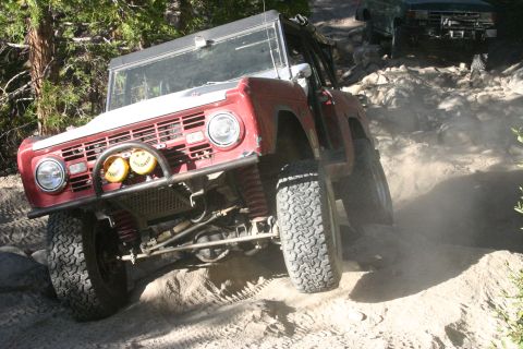 1991 Ford Bronco - This classic Ford Bronco navigates a challenging off-road course with another vehicle following.
