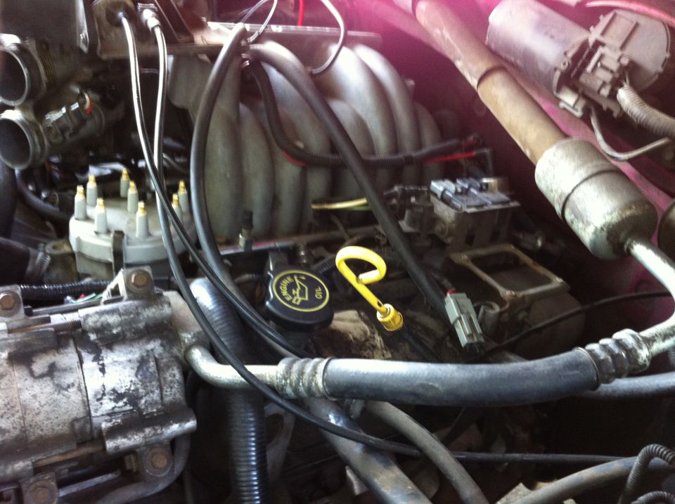 Most of the old stuff out. Left the cap on and plugs in while cleaning up a little.