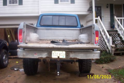 1979 Ford F-150 - The rear of a 1979 Ford F-150 pickup truck is shown, with a license plate reading 532 XSU.