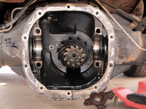 1994 Ford Bronco - Close-up view of a vehicle's differential housing, showing internal gears and bearings.