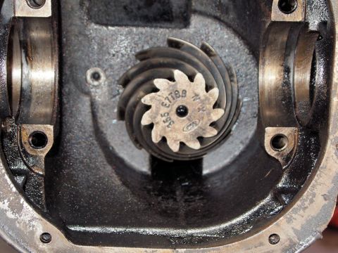 1994 Ford Bronco - Close-up of a differential gear with visible markings and a Ford logo.