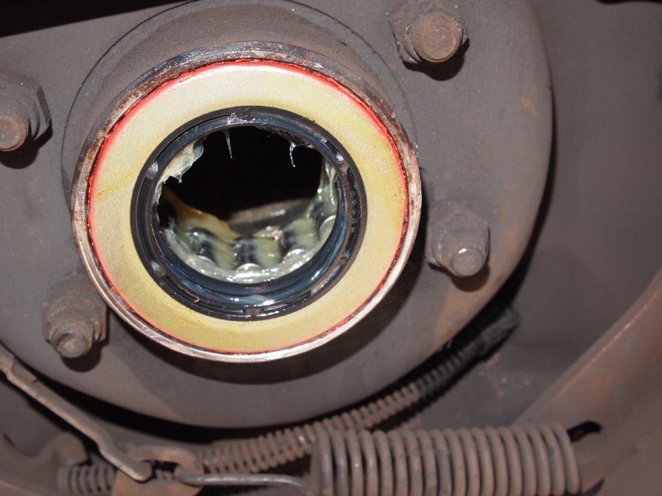 Wheel bearing seal with grease visible inside the hub