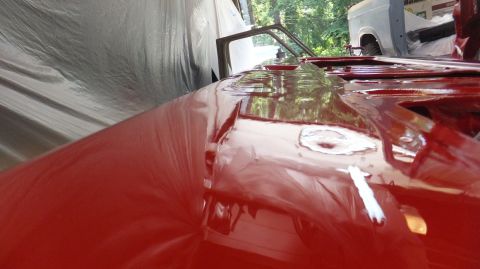 1983 Ford Bronco - Vehicle bodywork is being prepared for paint, with a second vehicle visible in the background.