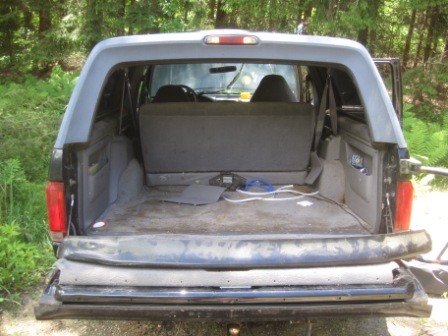 1993 Ford Bronco - Rear view of a 1993 Ford Bronco's cargo area and interior.