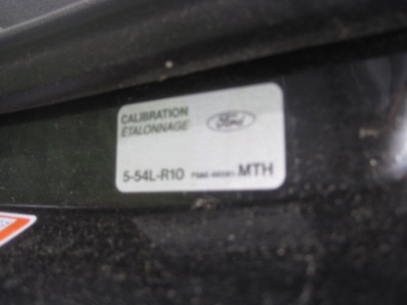 1993 Ford Bronco - Close-up of a Ford calibration sticker with part number S-54L-R10.