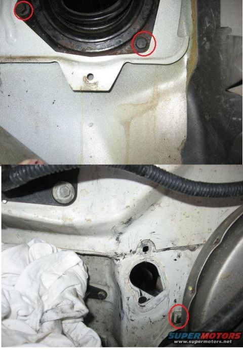 1992 Ford Bronco - Engine bay firewall area showing mounting bolts and a section of wiring harness.