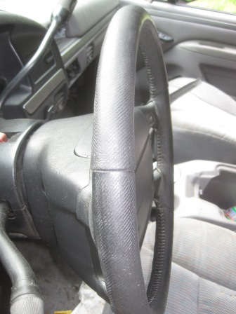 1993 Ford Bronco - Interior view of a 1992 Ford Bronco, with a visible steering wheel and dashboard details.
