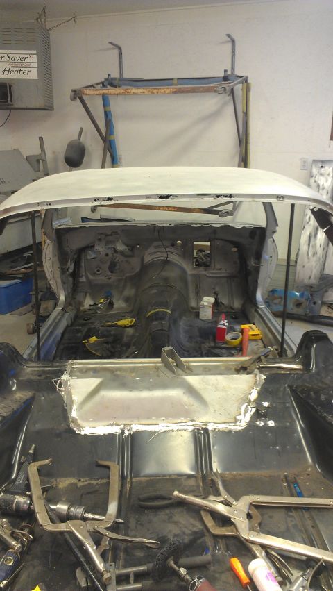 1970 Chevrolet Camaro - Interior of a 1970 Chevrolet Camaro undergoing restoration, with the floor pan and dashboard exposed.