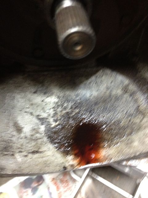 1986 Ford Bronco - Dark fluid is leaking from the transmission housing.