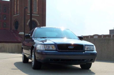 1998 Ford Crown Victoria - Pics taken after I replaced the chrome bumper strip with the gloss black bumper strips.