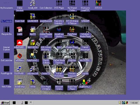 1993 Ford Bronco - A close-up of a tire and wheel is displayed on a computer desktop.