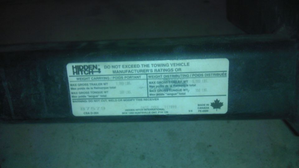 Trailer hitch rating label with weight limits and manufacturer information