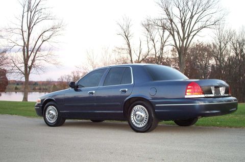 1998 Ford Crown Victoria - Notice the chrome trim on the rear fascia and chrome bumper strip.
