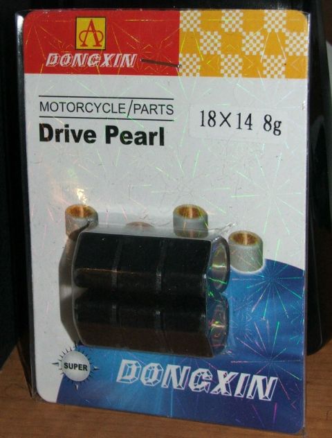 2008 Yamaha Zuma - A package of DONGXIN brand motorcycle drive pearls, measuring 18x14 and weighing 8g, is shown.