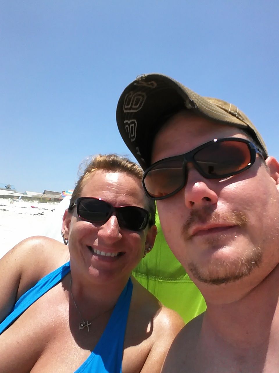 Couple on a sunny beach day