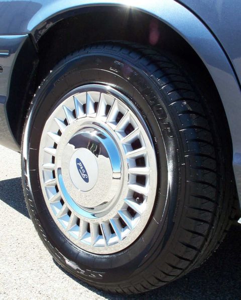 1998 Ford Crown Victoria - The new hubcaps. They are much brighter than the OEM ones.