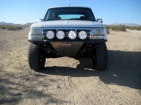 1996 Ford Bronco - This modified Ford Bronco is equipped with a custom bumper and auxiliary lights, ready for off-road adventures.