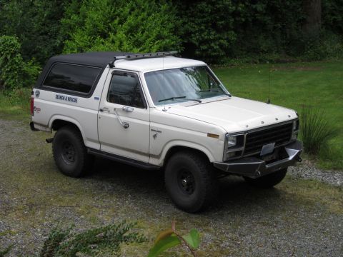 1989 Ford Bronco - This white Ford Bronco is equipped for search and rescue operations, a roof rack and distinctive side markings.