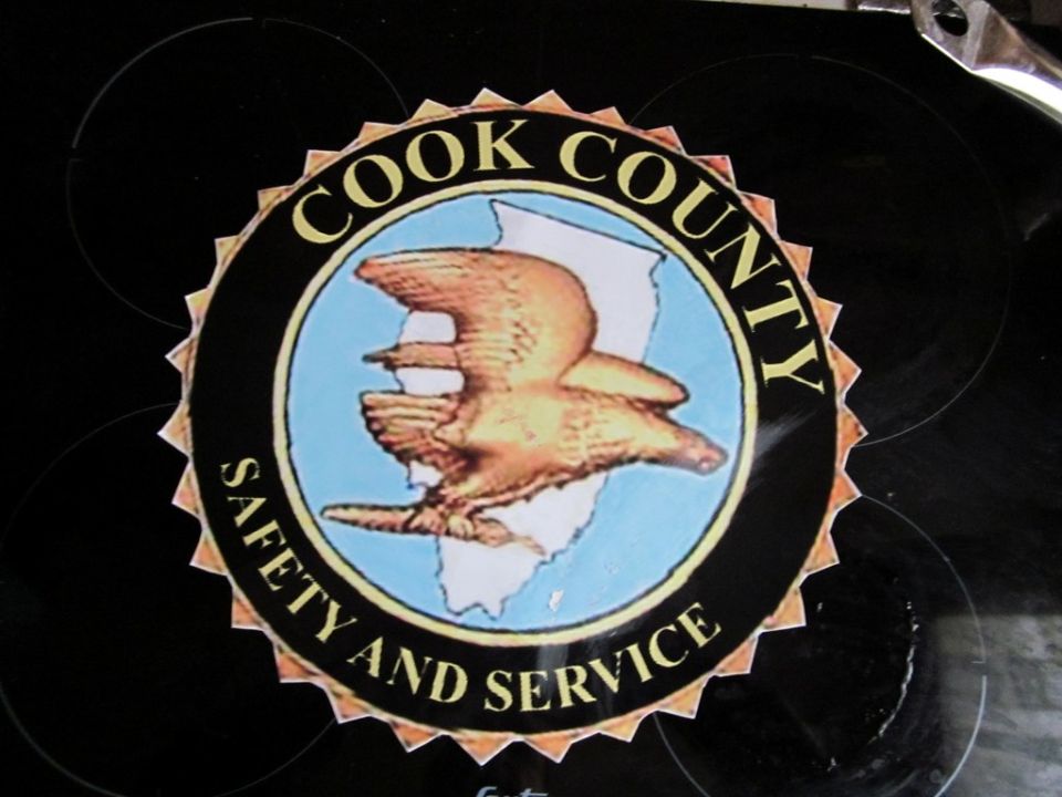 Cook County Safety and Service sticker with an eagle over Illinois outline