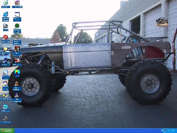 Windows XP desktop screenshot using a tube-frame rock buggy photo as wallpaper