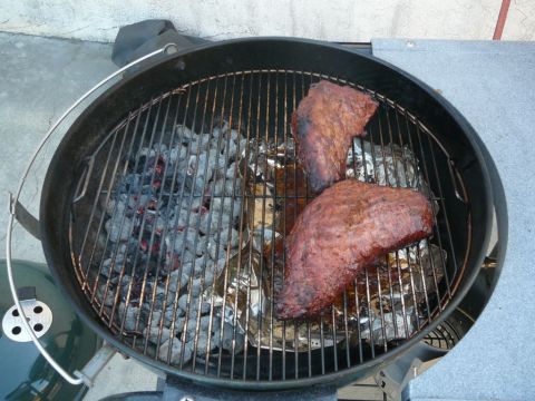 1988 Ford Bronco - Meat grilling on a charcoal barbecue, with the Supermotors.net logo visible.