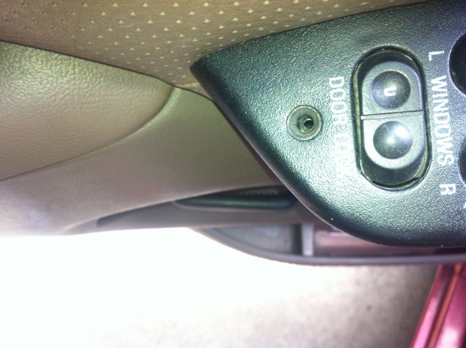 Interior door panel with window lock and L/R window controls