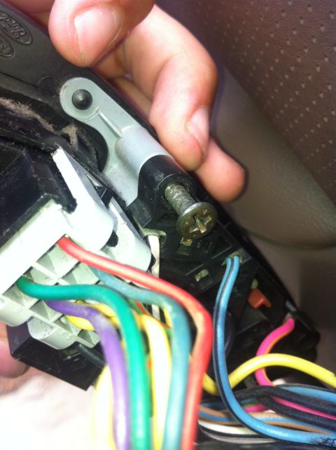1996 Ford Bronco - Wiring harness for a car door, showing multiple colored wires and connectors.