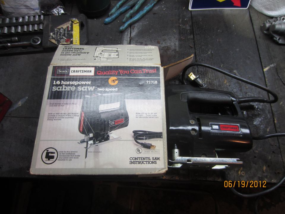 Craftsman sabre saw with its original box, showing "1/6 horsepower sabre saw two speed" and "Quality You Can Trust"