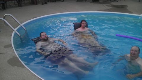 2000 Mercury Grand Marquis - Friends enjoy a cool dip in the pool during warm weather.