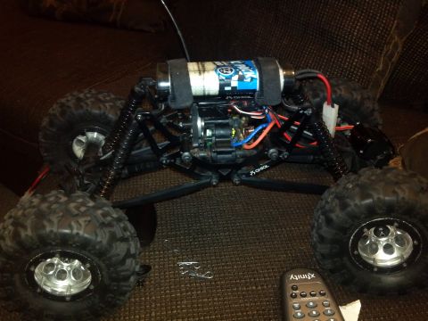1978 Chevrolet C/K Pickup - This remote control rock crawler features large, knobby tires and a visible motor and battery setup.