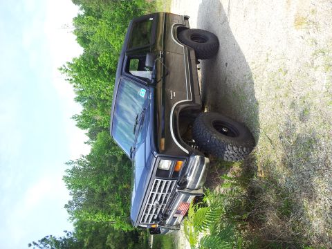1986 Ford Bronco - This 1986 Ford Bronco is shown in a 3q-front view, parked outdoors.