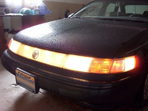 1995 Mercury Sable - Took this pic in my garage after driving in the rain. It has a nice effect with the light and water. I even turned on the cornering lamp fo…