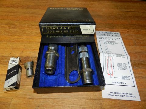 1996 Ford Bronco - A Lyman A-A Dies 2-Die Rifle Set is displayed with its original packaging and instructions.